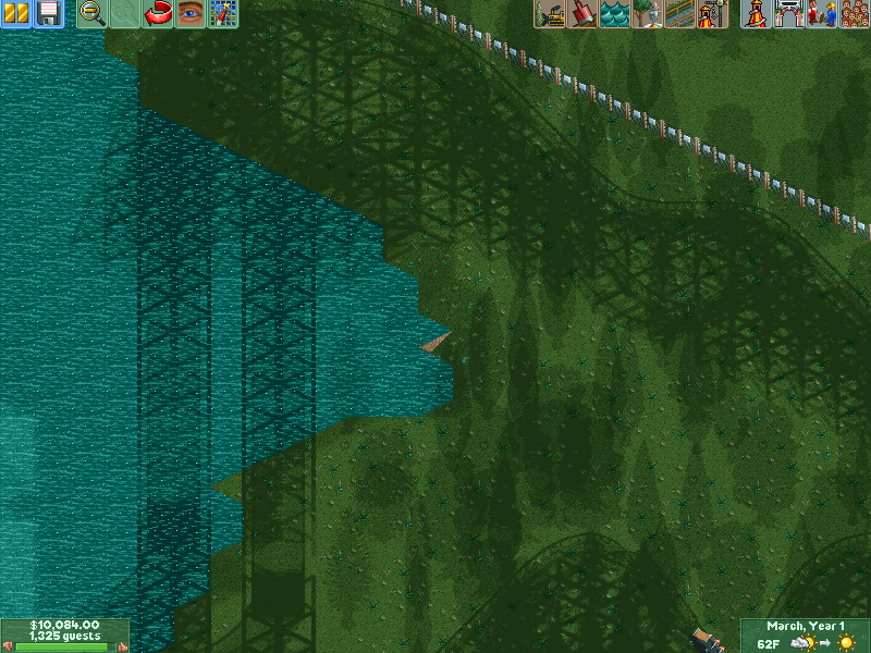 Screenshot of the RollerCoaster Tycoon2's Six Flags Holland scenario showing a tile where the water uncannily does not rest leveled with the land shore.